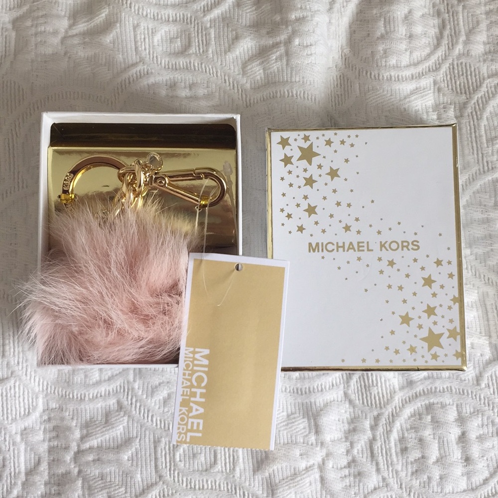 New with tags. Michael Kors fur Pom Pom